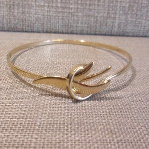 Vintage Avon Gold Tone Locking Bangle Bracelet
